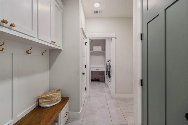 mudroom featuring light tile patterned flooring