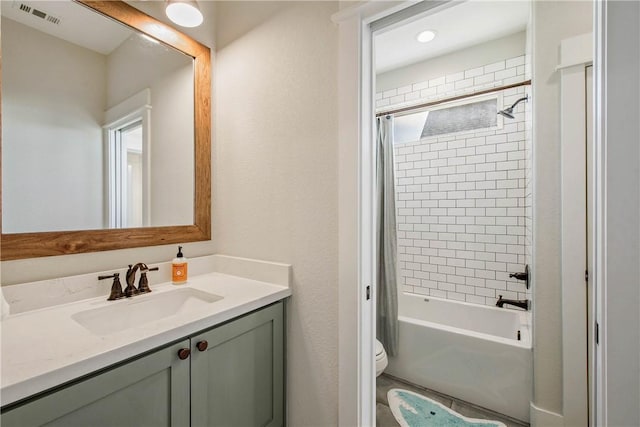 full bathroom with vanity, shower / bathtub combination with curtain, and toilet