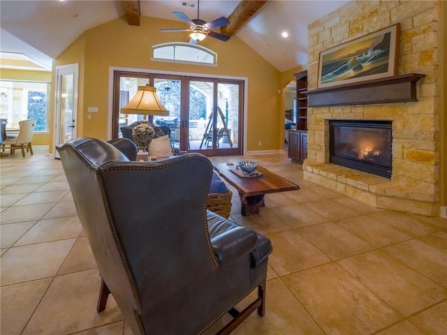 1142 Fletcher, Anderson, TX 77830 - living area featuring light tile patterned flooring, ceiling fan, and a fireplace