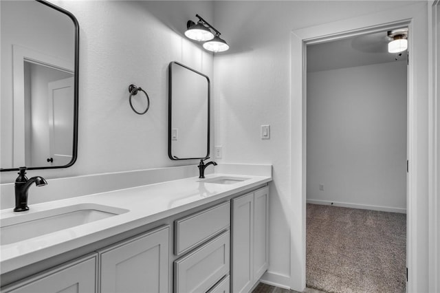 bathroom with vanity and ceiling fan