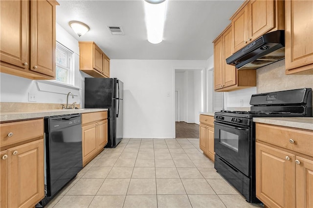 kitchen featuring black appliances, light tile patterned floors, tasteful backsplash, and sink