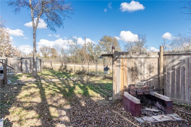 view of yard featuring fence