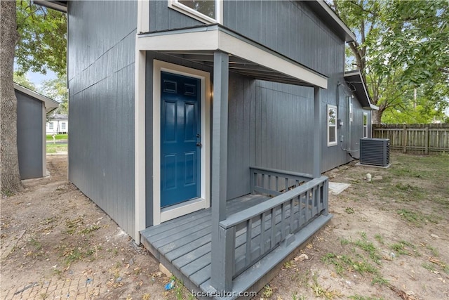 view of side of home featuring central AC