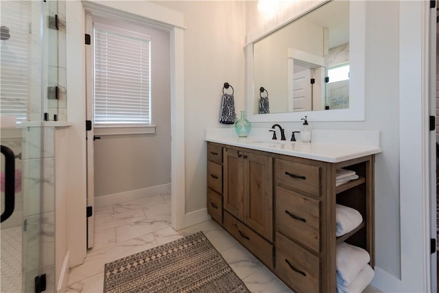 bathroom with vanity and an enclosed shower