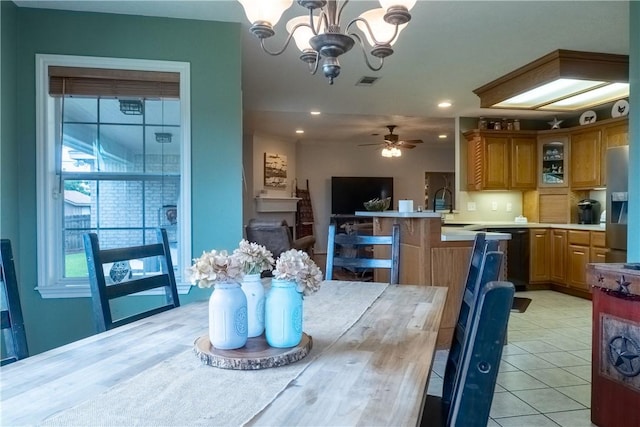 919 Alan Ln, Caldwell, TX 77836 - dining room with a chandelier, recessed lighting, ceiling fan, and light tile patterned floors