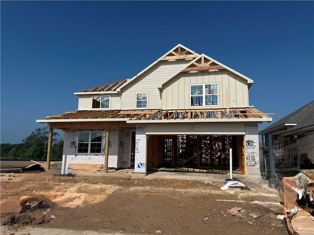 6308 Raleigh, College Station, TX 77845 - unfinished property featuring a garage, a metal roof, and board and batten siding