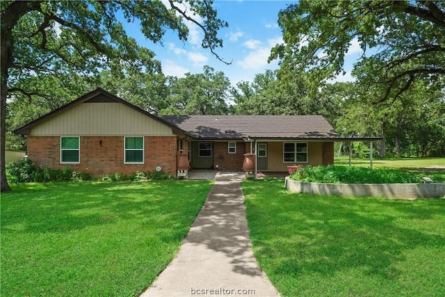 ranch-style house featuring a front lawn