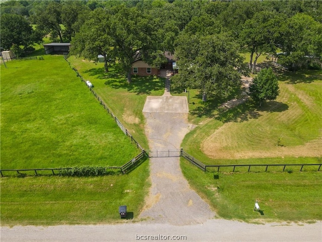 birds eye view of property featuring a rural view