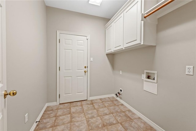 laundry room with hookup for a washing machine, cabinet space, electric dryer hookup, and baseboards