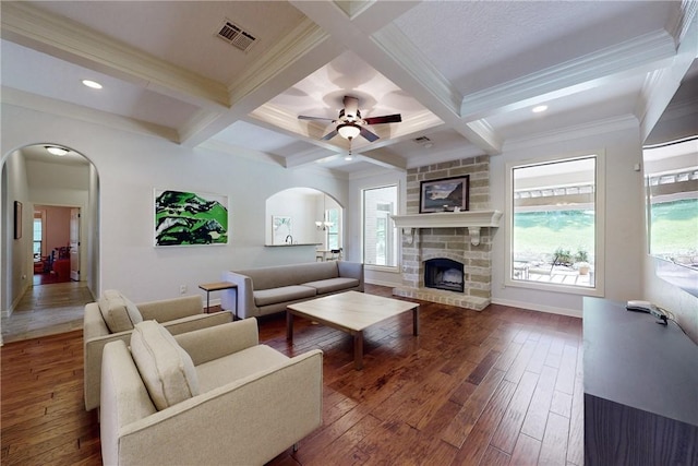 living room featuring beamed ceiling, dark hardwood / wood-style floors, and coffered ceiling