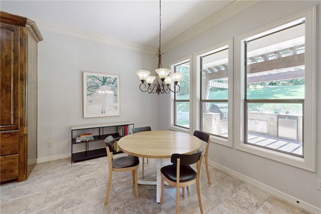 dining room featuring a chandelier and ornamental molding