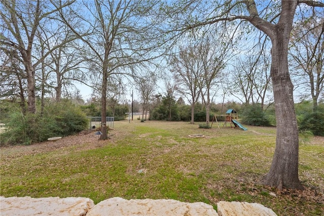 view of yard with a playground