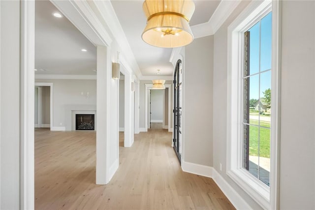 4724 Concordia Dr, Bryan, TX 77802 - hall with light wood-style flooring, baseboards, recessed lighting, and ornamental molding