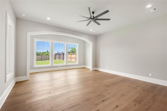 4724 Concordia Dr, Bryan, TX 77802 - empty room featuring ceiling fan, baseboards, light wood-style floors, and visible vents
