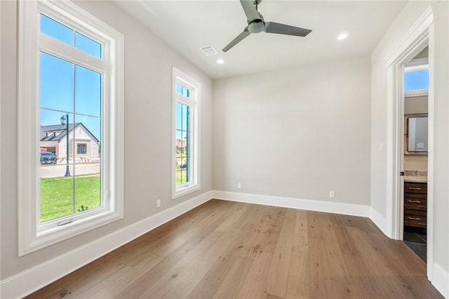4724 Concordia Dr, Bryan, TX 77802 - interior space featuring baseboards, wood finished floors, visible vents, and recessed lighting