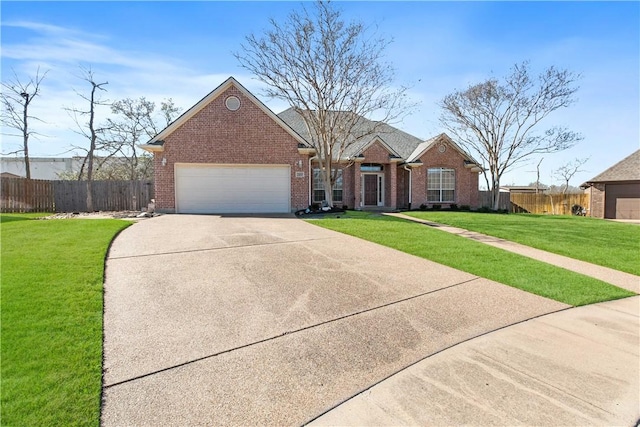 view of front of house with a front lawn and a garage