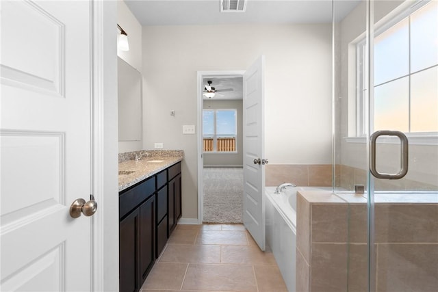 bathroom with separate shower and tub, ceiling fan, tile patterned flooring, and vanity