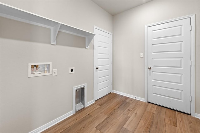 washroom with washer hookup, light hardwood / wood-style flooring, and electric dryer hookup