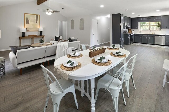 dining area with light wood-style flooring, vaulted ceiling with beams, a ceiling fan, and recessed lighting