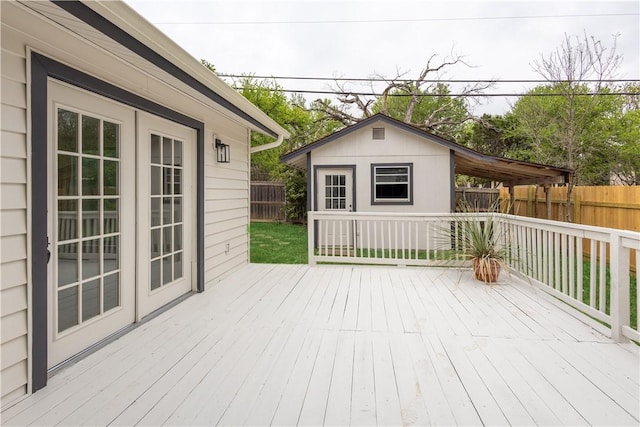 3012 Monument Dr, Round Rock, TX 78681 - wooden terrace featuring an outbuilding and a fenced backyard