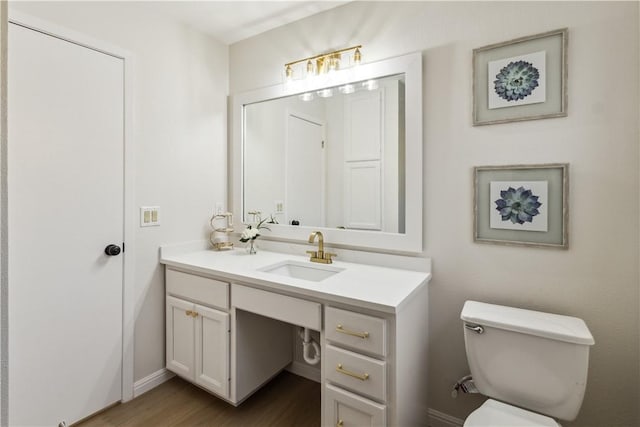 3012 Monument Dr, Round Rock, TX 78681 - half bathroom with vanity and wood finished floors