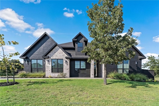 view of front of home with a front yard