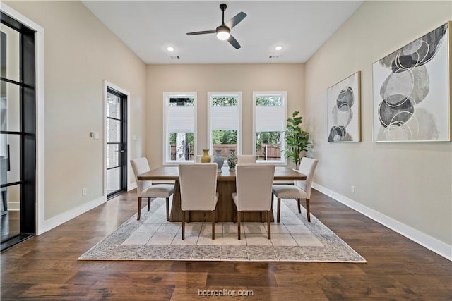 dining room with light hardwood / wood-style floors and ceiling fan