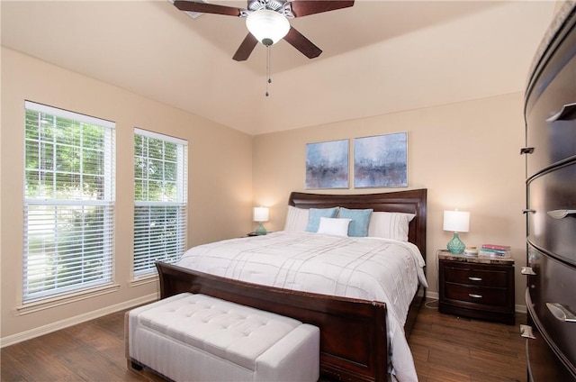 bedroom with ceiling fan and dark wood-type flooring