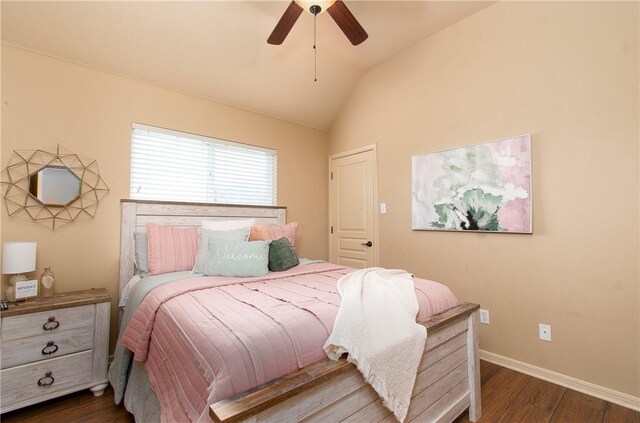 bedroom with lofted ceiling, ceiling fan, and dark hardwood / wood-style floors