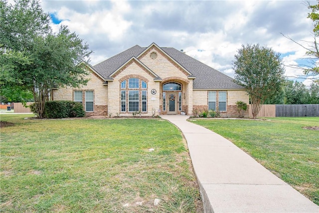 view of front of home with a front yard