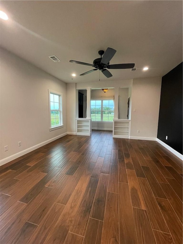 1692 Henry Prairie Rd, Franklin, TX 77856 - unfurnished living room featuring dark wood-style flooring, a ceiling fan, and recessed lighting