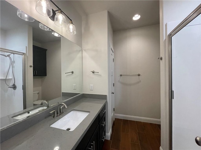 1692 Henry Prairie Rd, Franklin, TX 77856 - full bathroom with wood finish floors, vanity, and a shower stall