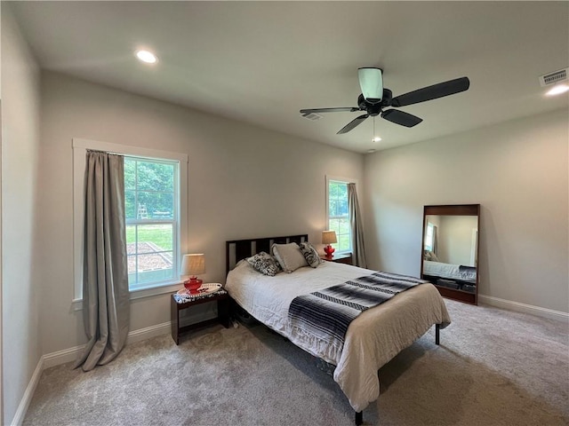1692 Henry Prairie Rd, Franklin, TX 77856 - bedroom featuring multiple windows, carpet flooring, recessed lighting, and a ceiling fan