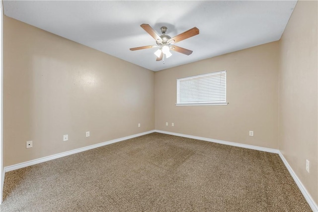 unfurnished room featuring carpet floors and ceiling fan