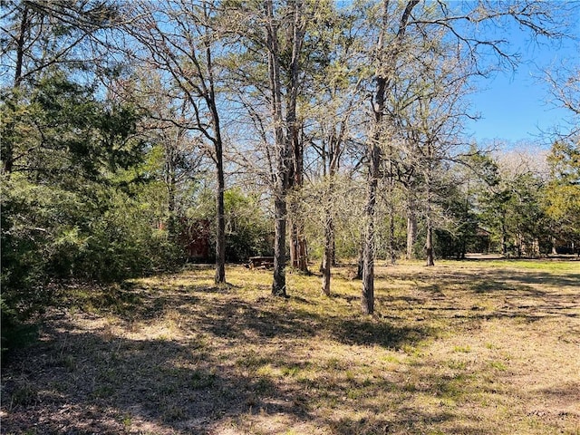 view of landscape with a view of trees