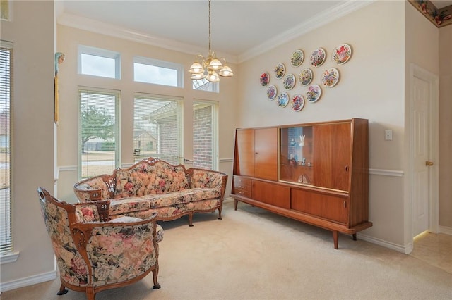 sitting room featuring light carpet, visible vents, baseboards, an inviting chandelier, and crown molding