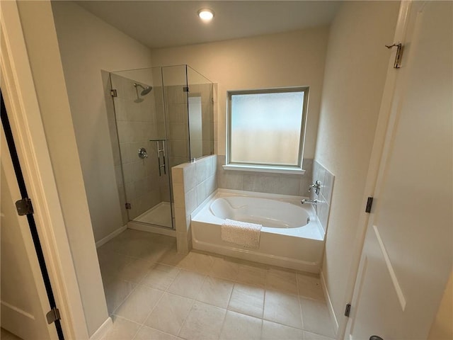6303 Raleigh Dr, College Station, TX 77845 - bathroom with a bath, tile patterned flooring, a shower stall, baseboards, and recessed lighting