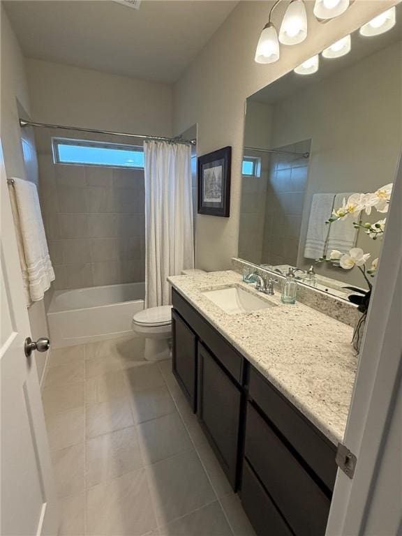 6303 Raleigh Dr, College Station, TX 77845 - full bath featuring vanity, toilet, shower / tub combo, and tile patterned flooring