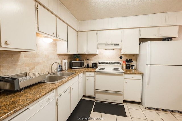 kitchen featuring white cabinets, white appliances, and sink