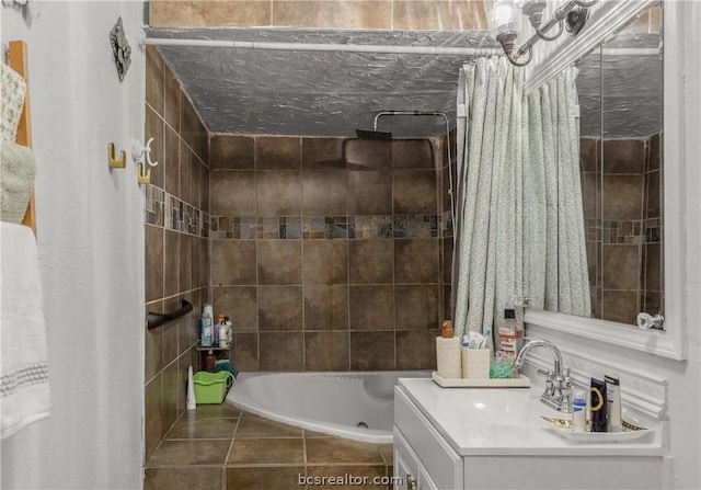 bathroom featuring vanity and shower / bathtub combination with curtain