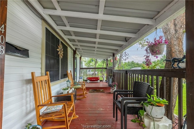 wooden deck with a porch