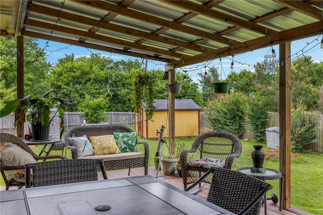 1819 Cheryl Dr, Caldwell, TX 77836 - fenced backyard with a storage unit and outdoor lounge area
