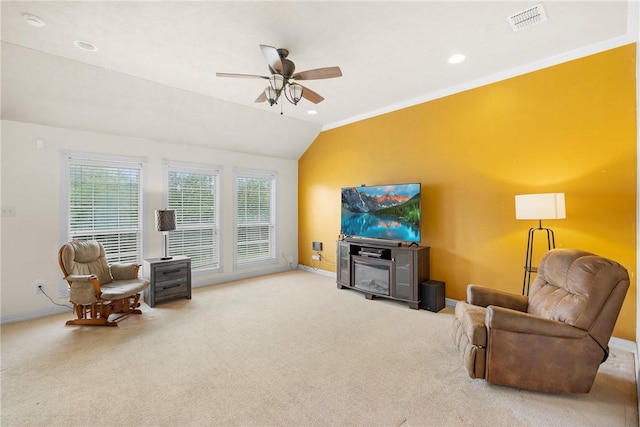 1819 Cheryl Dr, Caldwell, TX 77836 - carpeted living room with vaulted ceiling, ceiling fan, recessed lighting, and ornamental molding