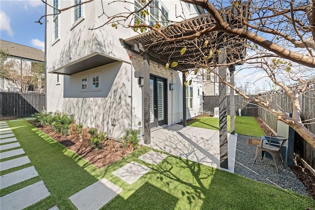 view of yard featuring a patio and a fenced backyard