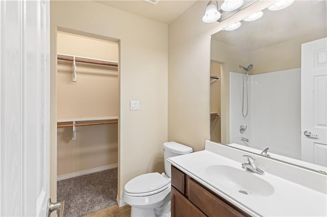 1198 Jones Butler Rd, College Station, TX 77840 - bathroom with vanity, a spacious closet, tile patterned flooring, and shower / washtub combination