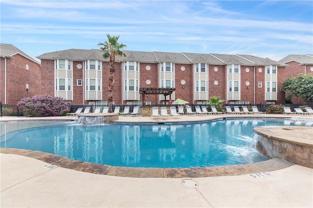 1198 Jones Butler Rd, College Station, TX 77840 - community pool with a residential view, a patio area, and a pergola