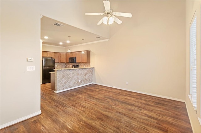 1198 Jones Butler Rd, College Station, TX 77840 - unfurnished living room with dark wood-style floors, crown molding, a ceiling fan, and recessed lighting