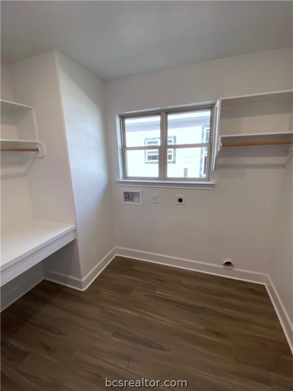 clothes washing area featuring hookup for a washing machine, dark hardwood / wood-style flooring, and electric dryer hookup