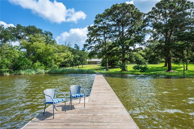 11188 Riley Green Rd, Franklin, TX 77856 - dock featuring a water view, a lawn, and view of scattered trees