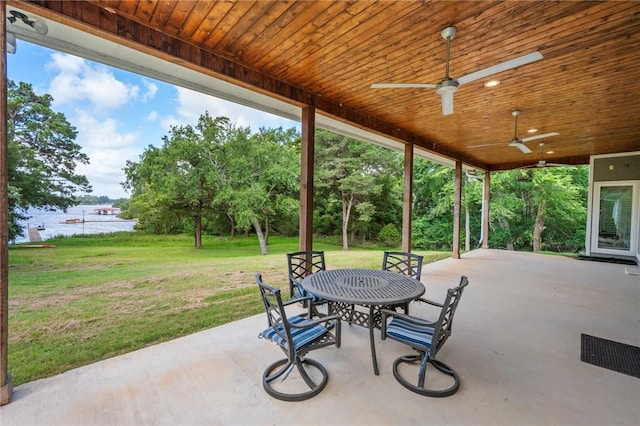 11188 Riley Green Rd, Franklin, TX 77856 - view of patio with a ceiling fan and outdoor dining area